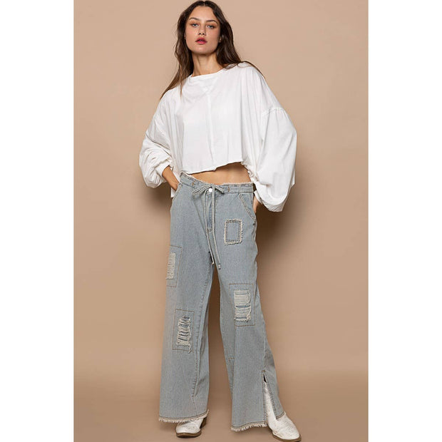 Bestseller “The Conrad” Distressed drawstring waist snap stripe denim wide leg pant