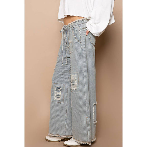 Bestseller “The Conrad” Distressed drawstring waist snap stripe denim wide leg pant