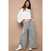 Bestseller “The Conrad” Distressed drawstring waist snap stripe denim wide leg pant